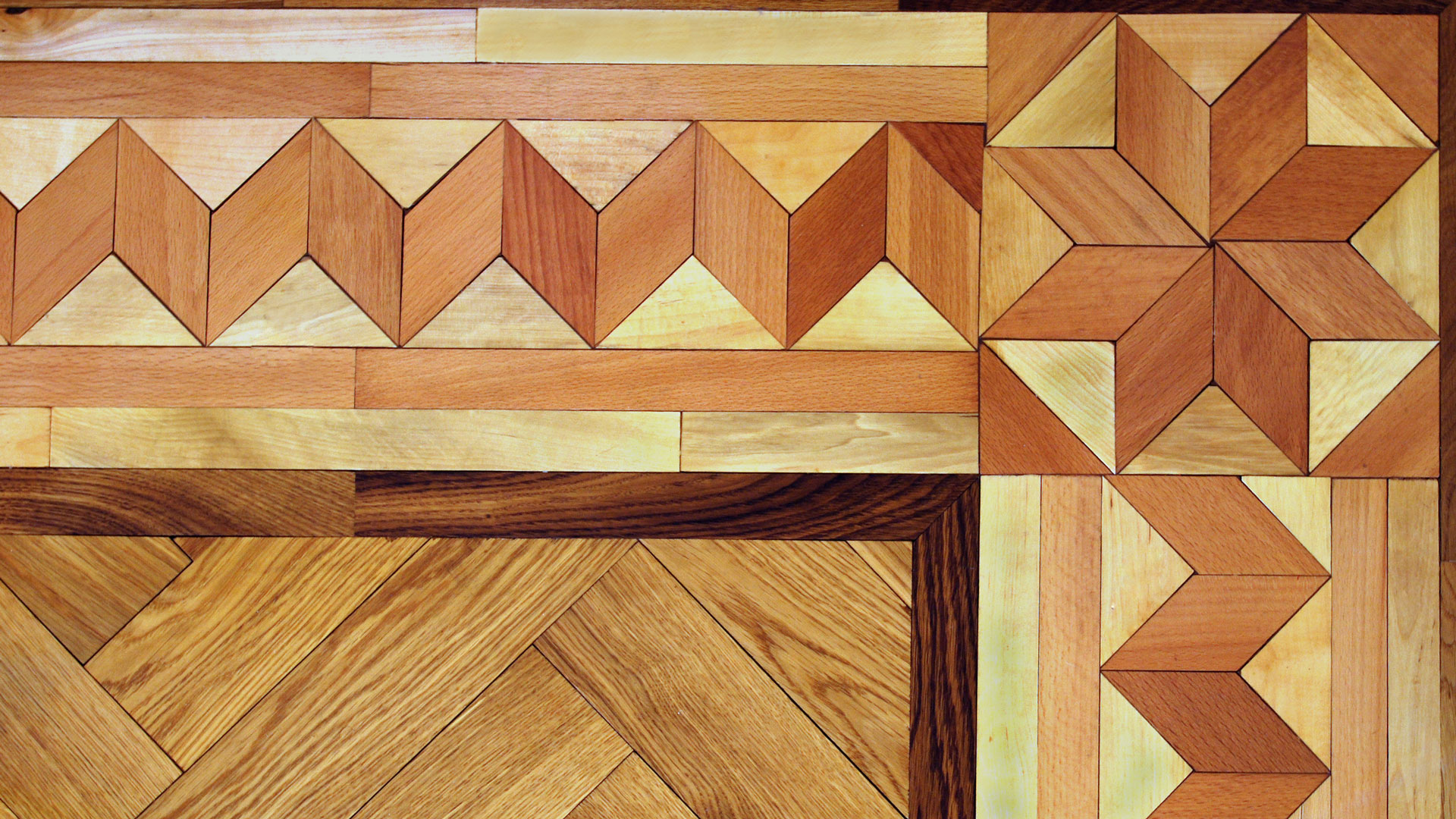 piso parquet decorativo usando parquets pequeño en formas geométricas para hacer parquets de diseño complejo